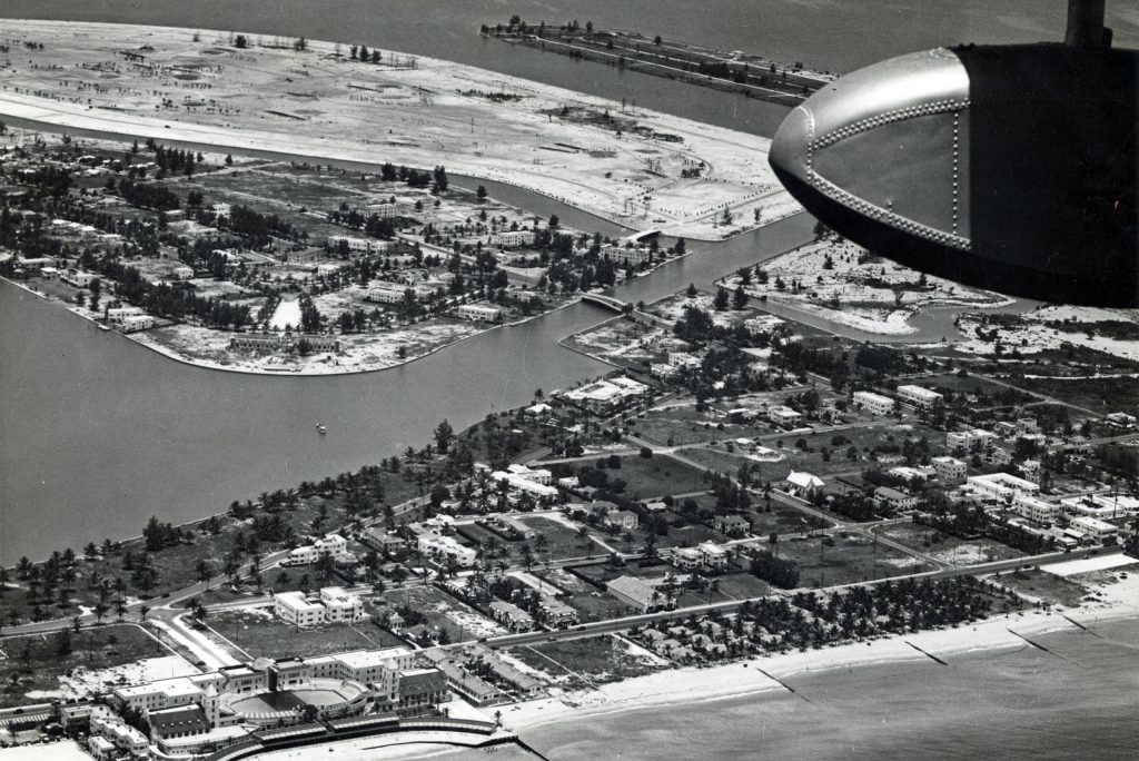 Black and white archival image. Aerial view of Normandy Isle and the North Beach area.