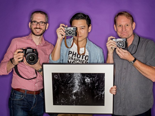 men with cameras