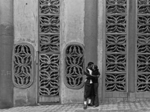 two people hugging and kissing
