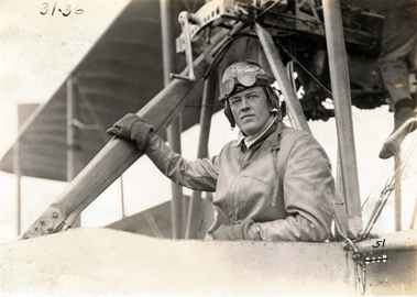 black and white image of a man in plane